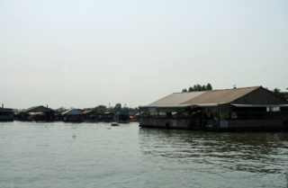 There are many fish farms lining the Mekong