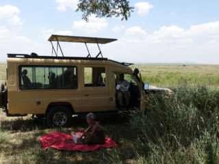 Sophie enjoying a picnic in the Serengeti, the rest of us stayed in the jeeps